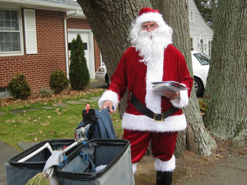 Bob Steck loved to dress up as Santa Claus during Christmas. The Cape Gazette published this picture in 2011. FILE PHOTO